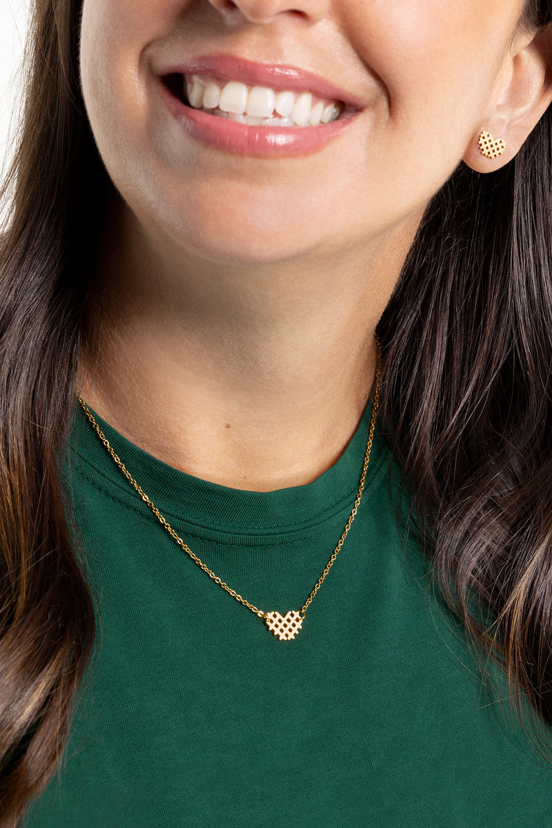 2-CFA_IHA_311050_HOL25_Merch_Waffle-Fry-Necklace_Earrings_Talent_On-white_1.jpg